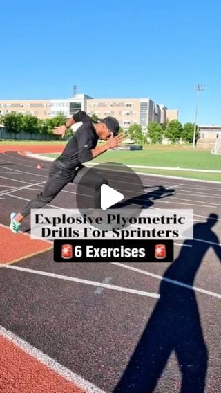 a man jumping in the air on top of a track