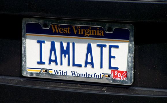 a license plate that reads, i am late