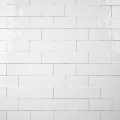 a white brick wall that is very clean