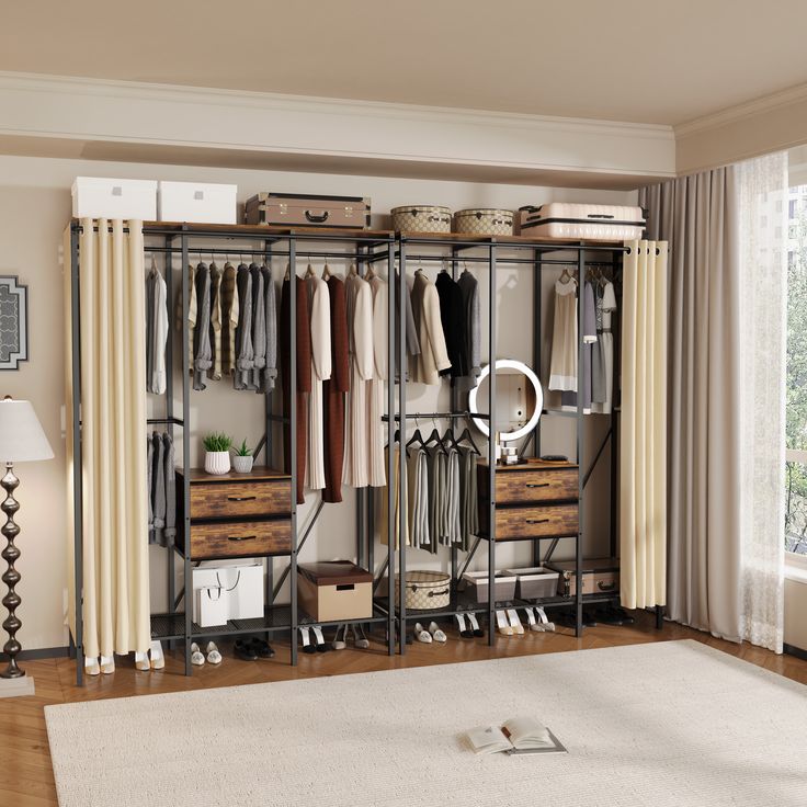 an organized closet with clothes, shoes and other items on shelves in front of a window