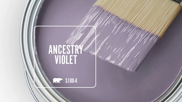 a purple paint can with a brush in it and the words xoxo painted on it