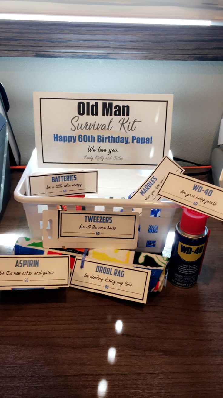 an old man birthday kit is sitting on a desk with other items and supplies around it