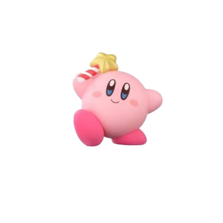 a pink toy with a gold horn on it's head and eyes, sitting in front of a white background