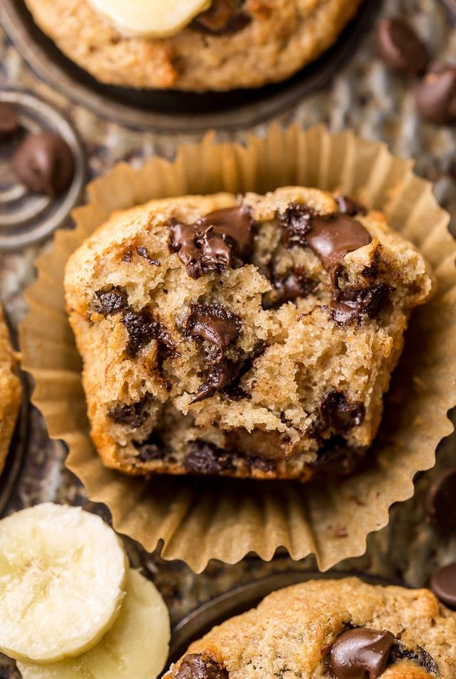 banana chocolate chip muffins are sitting on top of each other