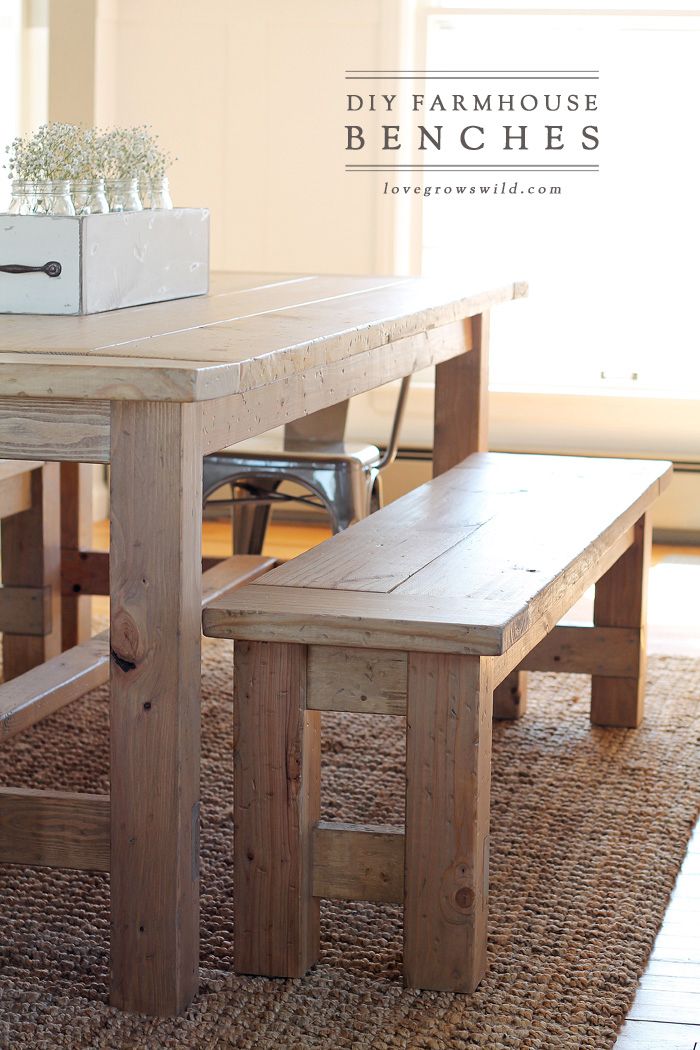 a wooden table with two benches in front of it and the words diy farmhouse house bench