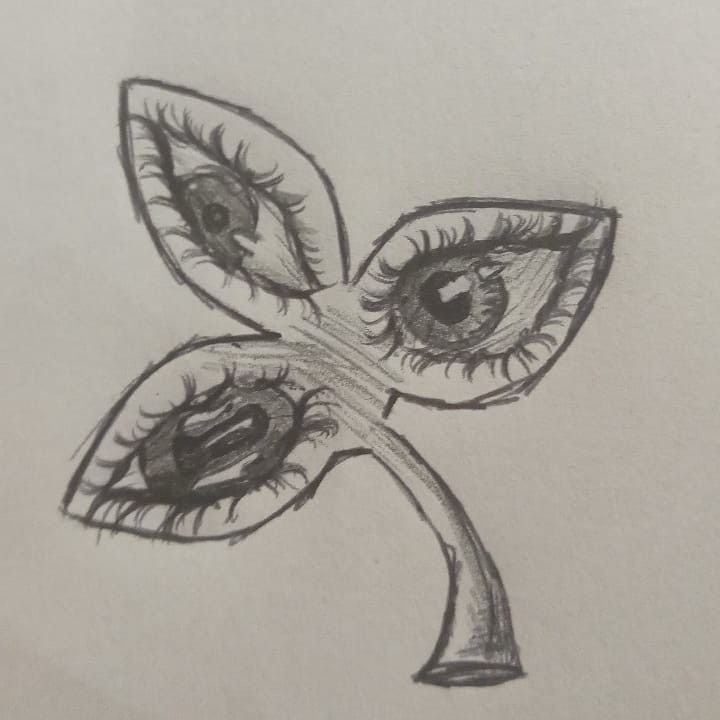 a pencil drawing of an eye with leaves on the top and bottom part of it