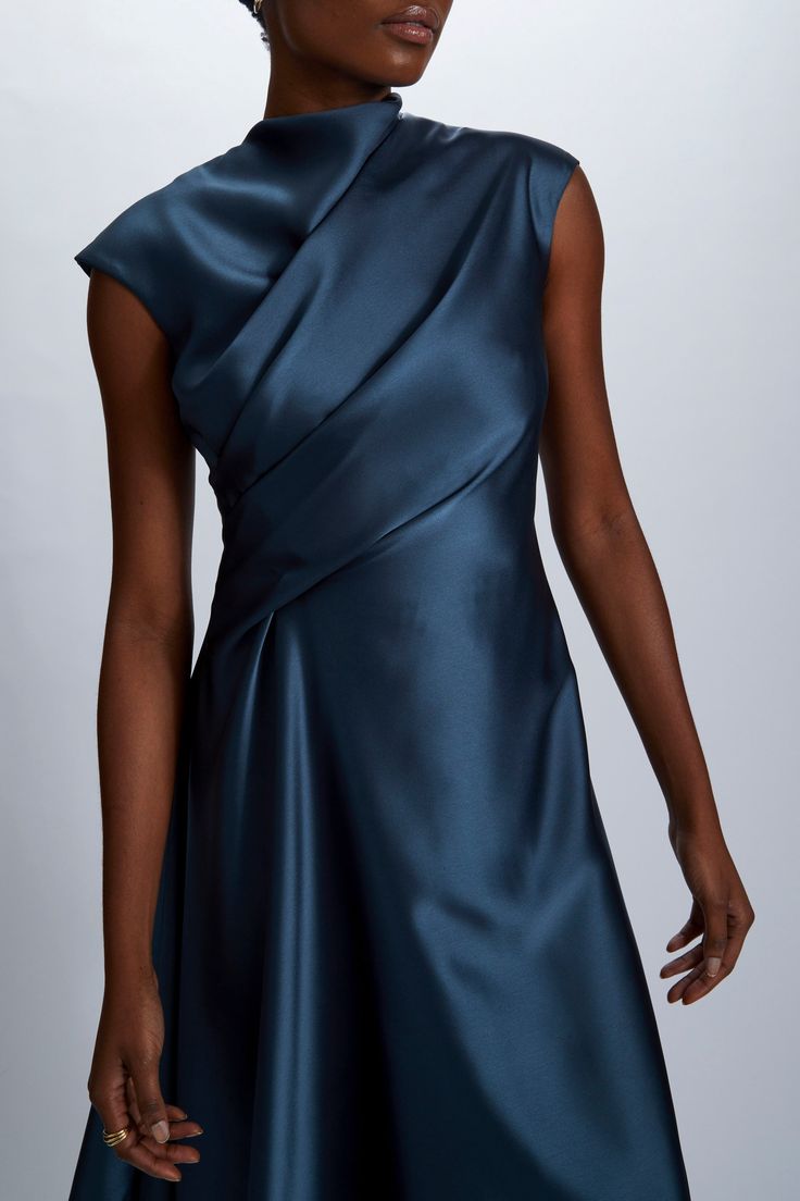 Fluid Satin relaxed drape dress with asymmetric handkerchief hem. Shown in Petrol. It is possible to have this style Made to Order in any of our standard Fluid Satin colors, please reach out to customerservice@amsale.com to place an order. Designer Couture Gowns, Front Drape Dress, Formal Draped Dress, Chanderi Dress Designs, Edgy Formal Dresses, Silk Asymmetrical Dress With Asymmetrical Neckline For Evening, Pre-draped Asymmetrical Dress For Evening With Bias Cut, Elegant Asymmetrical Silk Dress With Draped Sleeves, Elegant Silk Asymmetrical Dress With Draped Sleeves