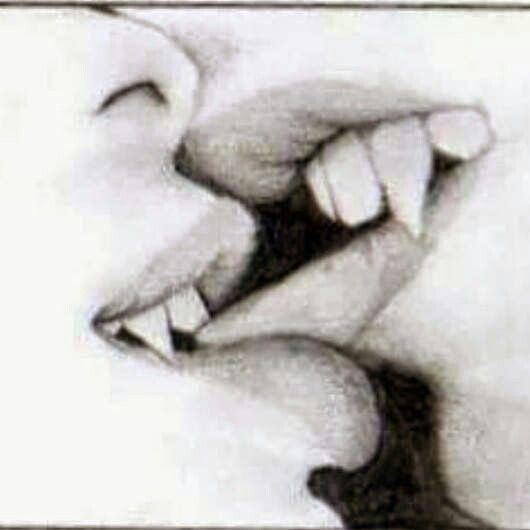 a black and white photo of two hands holding each other with their mouths wide open