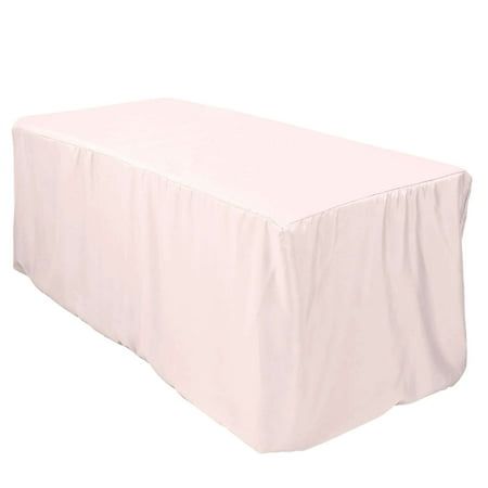 a white table with a cover on it