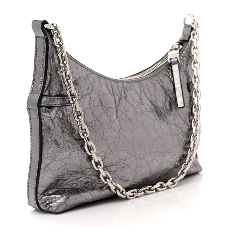 This is an authentic GIVENCHY Metallic Calfskin Mini Voyou Bag in Silver. This sleek bag is crafted of metallic laminated calfskin in silver. The bag features an adjustable leather shoulder strap with silver hardware. The top opens to a black fabric interior with a zipper pocket. Mini Antigona, Pandora Black, Bag Silver, Diamond Quilt, Wallet Chain, Pearl Grey, Black Cross Body Bag, White Bag, Silver Hardware