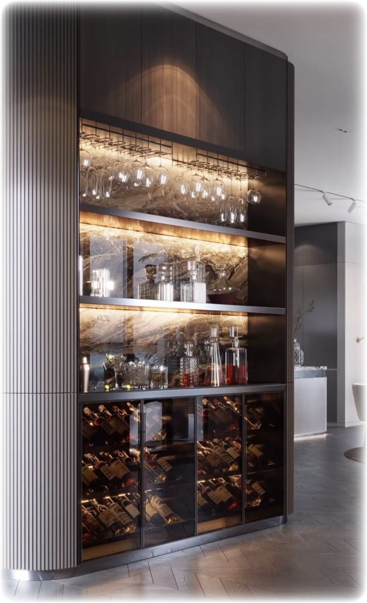 a wine bar with many bottles and glasses on it's glass shelves in a room