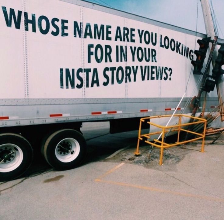 a large white truck parked in a parking lot next to a yellow ladder with the words who's name are you looking for in your insta story views?