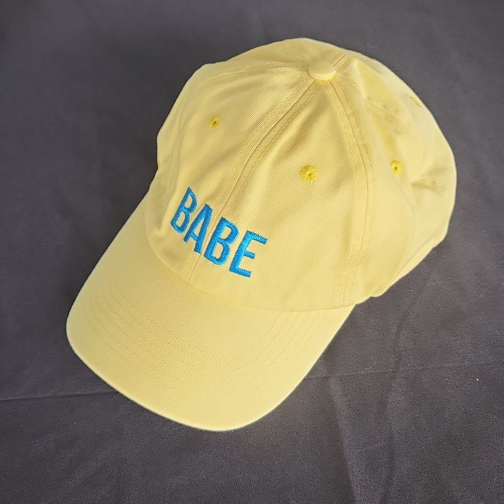 Babe Wine Branded Yellow Retro Looking Ball Cap Hat. These Are So Cute On, I Have Yet To See Someone Who Doesn't Look Good In One Of These Babies :) 1990s Style 90s Style Adjustable Hats For Summer, 90s Style Adjustable Summer Hats, Trendy Adjustable Yellow Dad Hat, Trendy Yellow Baseball Cap With Visor, Trendy Yellow Visor Baseball Cap, Trendy Yellow Hat For Streetwear, 90s Summer Cap, 90s Summer Streetwear Hats, 90s Style Summer Cap