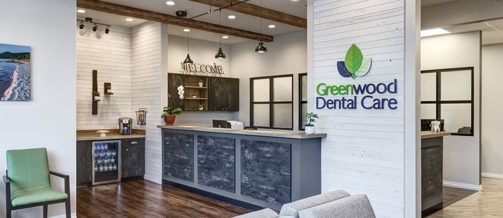 the greenwood dental care office is clean and ready for customers to use it's front desk