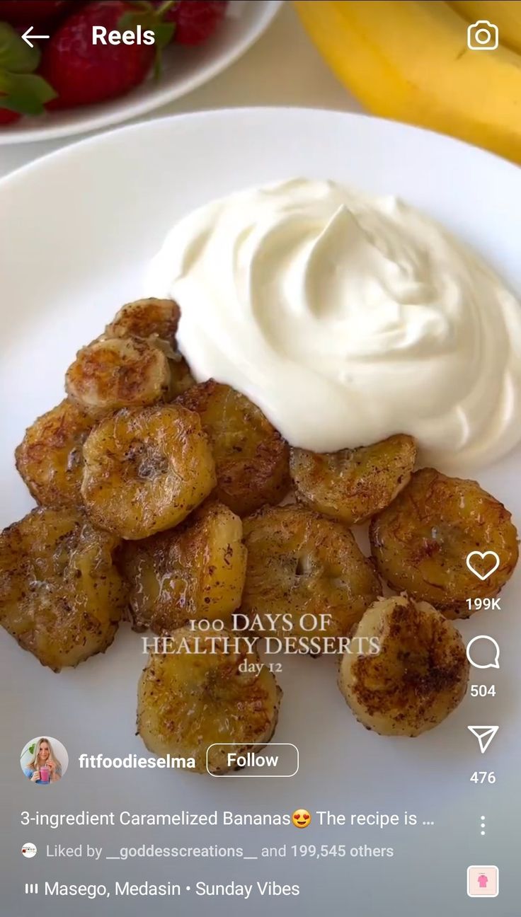 bananas and whipped cream on a white plate