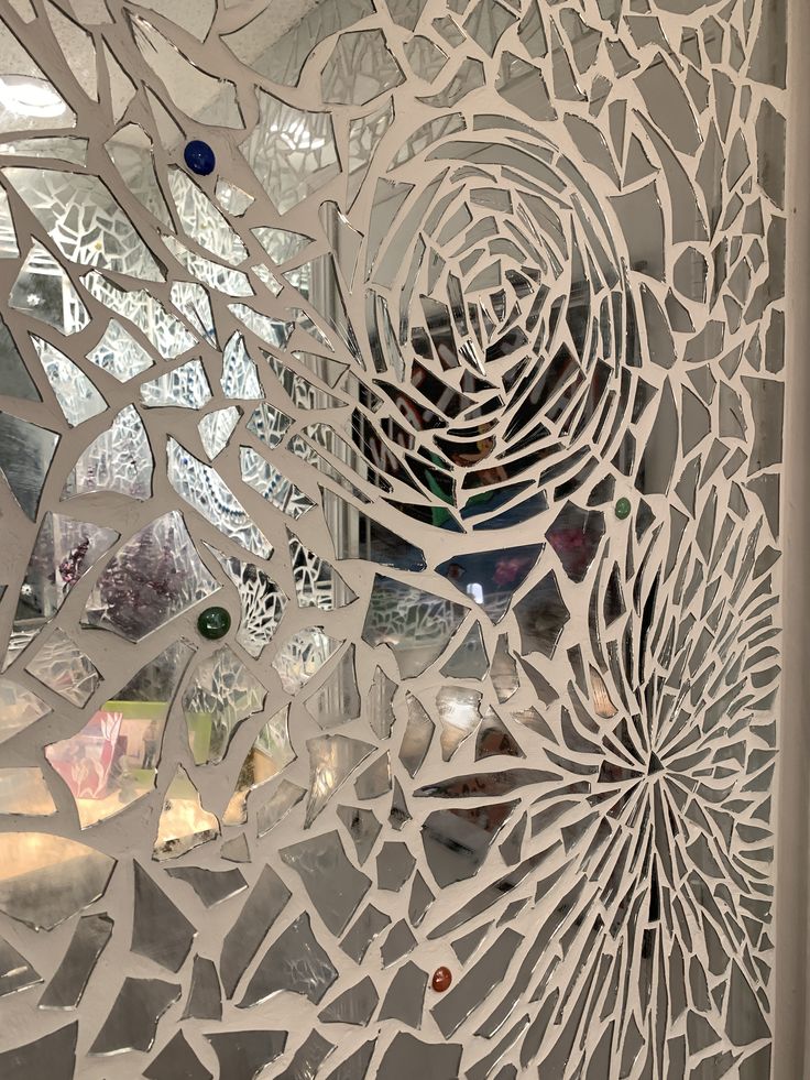 an intricately designed glass door is shown