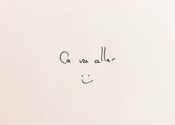 a black and white photo with the words ca va alla written on it in cursive writing