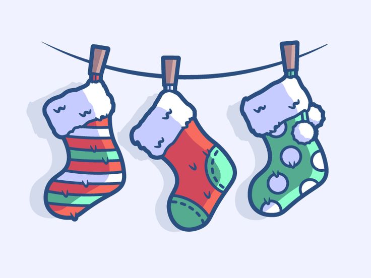 three christmas stockings hanging on a clothesline with snowing balls and mittenss