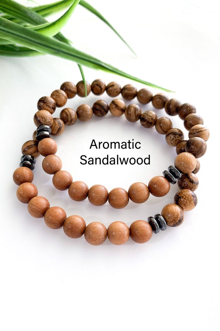 8mm Tigerskin Sandalwood Bracelet, Unisex Stacking Bracelet, Wrist Mala For Meditation, Deep Relaxation, Soothing, Stress Relief, Calming, Yoga Gifts This 8mm unisex bracelet is designed with aromatic Tigerskin and smooth sandalwood beads from India to keep you well-balanced, positive and happy. It is gorgeous on its own or perfect for stacking. Excellent for meditation!  The fragrance of sandalwood helps the mind unwind, as well as increases spiritual energy.  Accented with electroplated black Sandalwood Bracelet, Sandalwood Scent, Meditation Tools, Wrist Mala, Deep Relaxation, Yoga Gifts, Mala Bracelet, Unisex Bracelets, Spirituality Energy