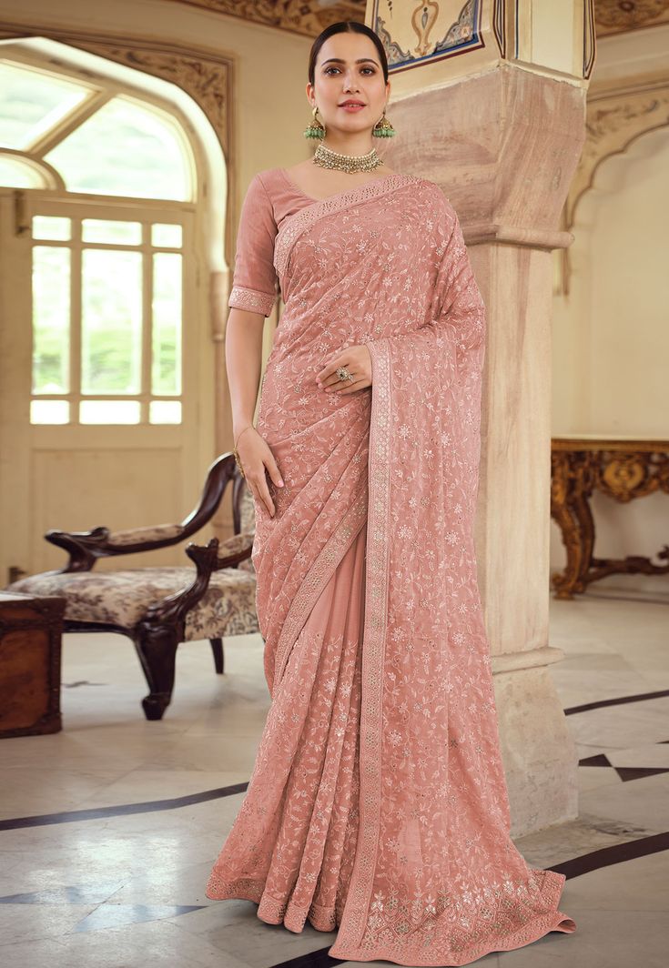 Pink chiffon saree with blouse 7526  Desc:  Color : Pink Fabric : Chiffon Work : Gota   Embroidery Wash Care : Dry clean Sleeve Style : Half Sleeve Long Sleeves : Done only in Custom Stitch Sleeves Lining : Done only in Custom Stitch Bust Size : 32 to 42 Inches Occasion : Festival   Christmas   Diwali   Pongal   Lohri   Teej   Durga Pooja   Ganesh Charturthi   Onam   Vaisakhi. With Express Free Shipping and Custom Stitching, Buy Indian Wedding Party Wear Saree Pink chiffon saree with blouse 7526 Peach Saree, Saree Sale, Designer Sarees Collection, Party Wear Saree, Embroidered Saree, Half Sleeve Blouse, Designer Sarees Online, Casual Saree, Trendy Sarees