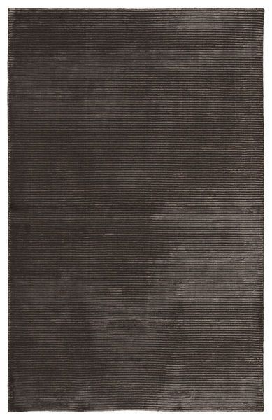 an area rug with dark brown stripes on it