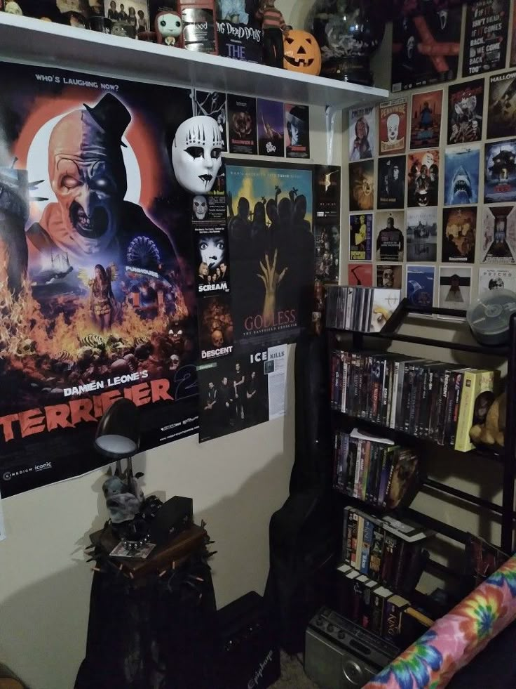 a room filled with posters and movies on the wall