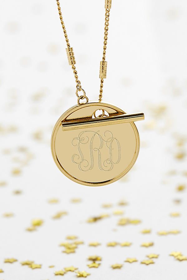 Please note that all sales are final. The Brook & York Custom Monogram Toggle Necklace offers a hint of shimmer and can be worn on its own or with any other necklace for a layer effect. This monogram necklace is the perfect custom gift for a bridesmaids, birthday for her, anniversary or a gift for yourself. Important Customization Information: A brook & york representative will reach out via email to confirm desired customization after purchase. Production time of your piece does not start until after your customization has been received. Your order will be cancelled if your customization is not confirmed within 1 week from purchase. brook & york- As an American-inspired, American-made company it is important to us that all of our jewelry is made here in the USA with supreme care and lovin Yellow Gold Round Pendant Toggle Necklace, Yellow Gold Toggle Necklace With Round Pendant For Gift, Yellow Gold Medallion Toggle Necklace Gift, Gold Medallion Toggle Necklace As Gift, Gold Medallion Toggle Necklace For Gift, Gold Necklace With Toggle Clasp For Anniversary, Engraved Round Toggle Necklace Gift, Minimalist Round Pendant Toggle Necklace For Gift, Modern Necklaces With Toggle Clasp For Gift