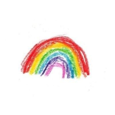 a drawing of a rainbow with colored crayons in the bottom right hand corner