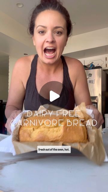 a woman holding a loaf of bread in front of her face with the caption, dairy free and an avocado bread