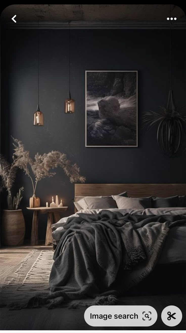 an image of a bedroom with dark colors