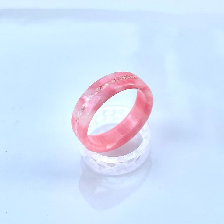 **Current processing time has been reduced to 6-8 weeks. Each ring is made to order in the order received. Thank you so much for your support and patience! 🎁 FREE Wood Ring Box with every ring purchase! 💎 Diamond Dust Ring made of real diamonds! Comes with a Certificate of Authenticity for the diamonds. Ring shown is 6mm wide with an Opal accent stripe. I will create rings at this width unless otherwise specified. If you are not purchasing a metal liner for the ring I can make from 2mm to 10mm Ring Resin, Wood Ring Box, Diamond Dust, Wood Ring, Diamonds Ring, Resin Ring, Wood Rings, Apple Blossom, Pink Ring