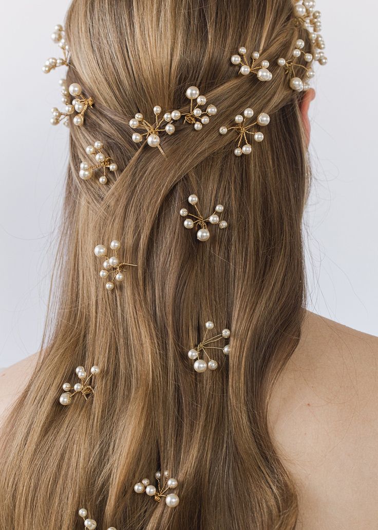 The Primavera Hair Pins were inspired by the ethereal essence of a Botticelli painting. Each pin in this set of three is comprised of numerous Swarovski pearls, which are meticulously strung by hand in our Brooklyn studio, creating a diaphanous spray of pearls with the illusion they're floating in midair. Consider pairing with the matching Primavera Circlet, or mixing with the Perla Bobby Pins. Packaging Dimensions: 6.5 x 6.5 x 1.75 inches Weight: Pearl Pins In Hair, Pins Packaging, Pearls In Hair, Rose Knight, Hair Pearls, Bridesmaid Hair Inspo, Ethereal Essence, Pearl Hair Clips, Beaded Hair Pins