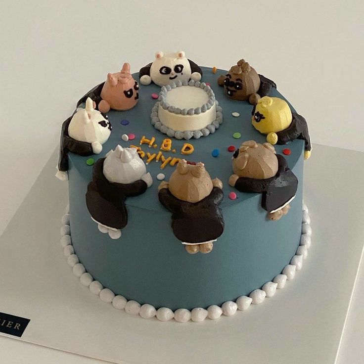 there is a cake decorated with animals on it