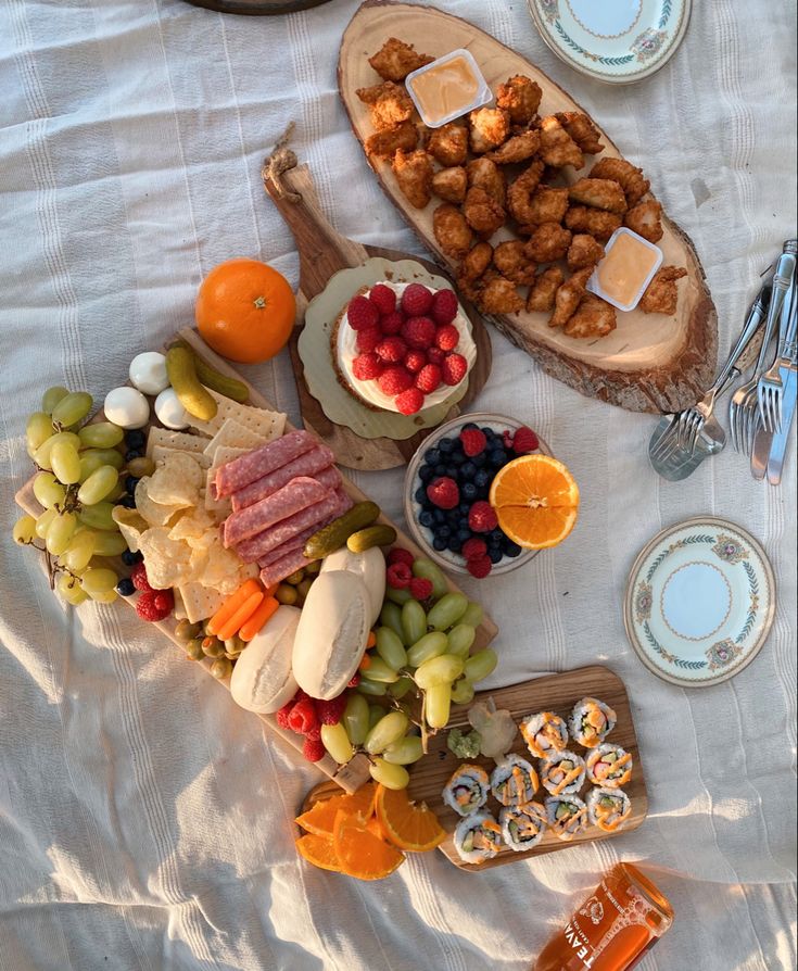 an assortment of appetizers are arranged on a table