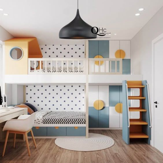 a bedroom with bunk beds, desks and shelves on the wall next to a window