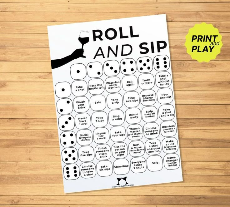 a roll and sip game on a wooden table