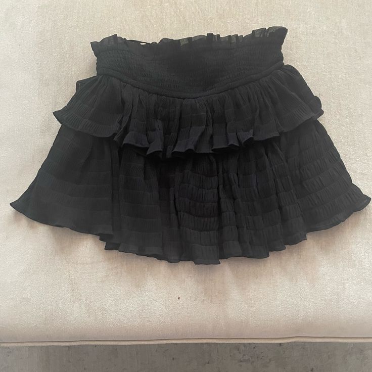 Black Layered Skirt New With Tags Black Fitted Tiered Mini Skirt, Black Layered Skirt, Fur Mini Skirt, Salmon Skirt, Black Ruffle Hem Mini Skirt, Black Tiered Ruffle Mini Skirt, Luxury Black Tiered Mini Skirt, Button Down Denim Skirt, Harajuku Mini Skirt With Ruffled, Tiered Design