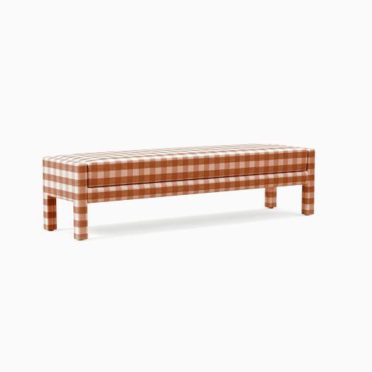 an orange and white checkered bench on a white background