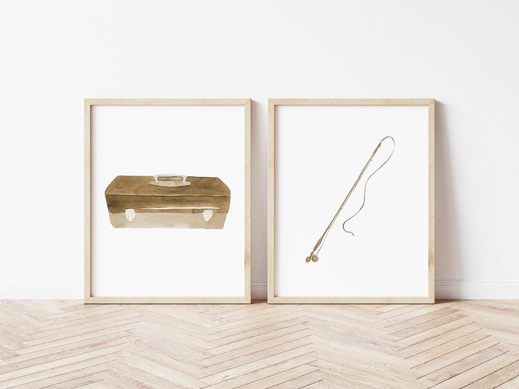 two framed art prints on the wall, one with a suitcase and another with a stick