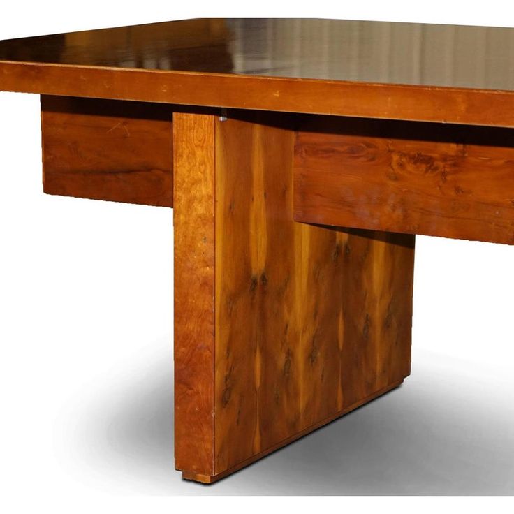 a wooden table that has been made to look like it is being used as an office desk