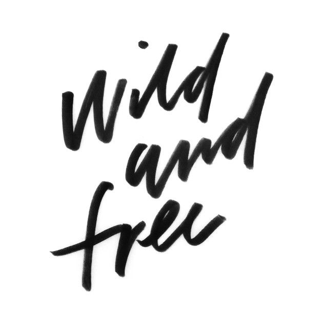 the words wild and free written in black ink