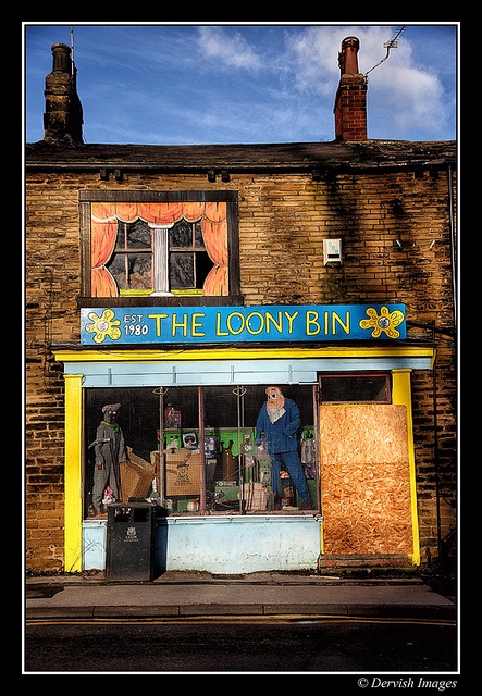 an old store front with the door open