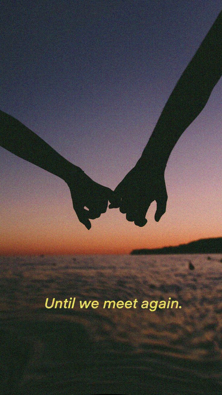 two people holding hands with the words until we meet again in front of an ocean