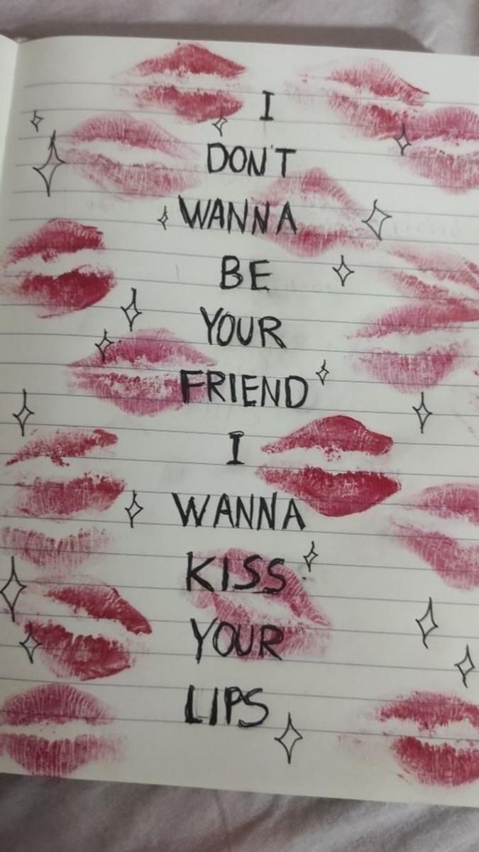 a notebook with lipstick drawn on it and the words i don't wanna be your friend