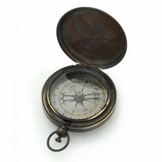 an old style compass on a white background