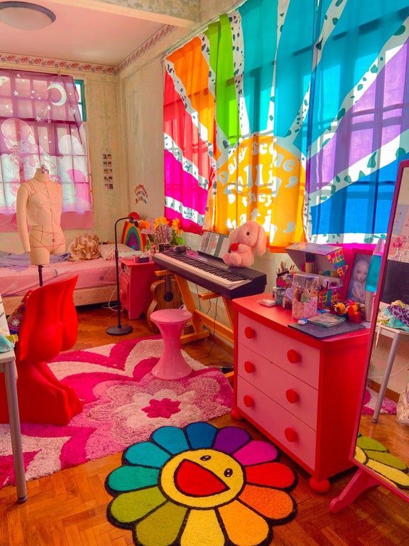 a brightly colored room with lots of furniture