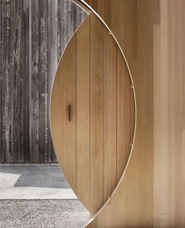 an image of a wooden wall with a circular design on it