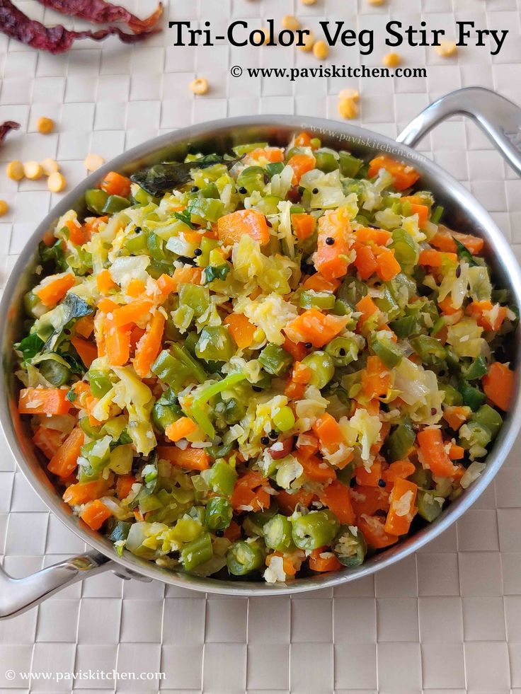 a pan filled with carrots, celery and other vegetables