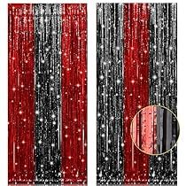 two red and black striped curtains with silver glitters on the bottom one is open