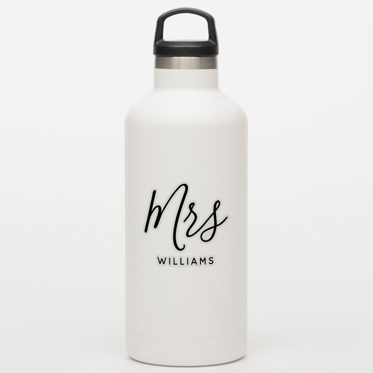 a white stainless steel water bottle with the word boss on it and black handle, against a white background